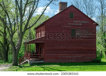 Toronto, ON, Canada – May 15, 2022: View the over forty 19th-century buildings in the open-air heritage museum Black Creek Pioneer Village in Toronto, Ontario, Canada. 