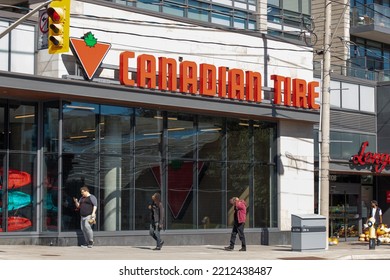 Toronto, ON, Canada - October 5, 2022: People Are Seen Walking By A Canadian Tire Retail Store In Downtown Toronto On A Sunny Day. 