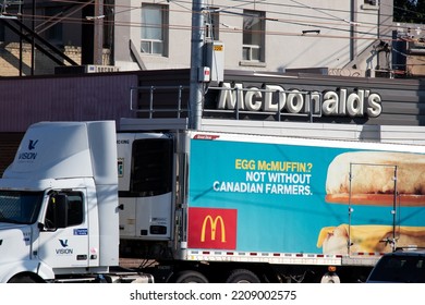 Toronto, ON, Canada - September 15, 2022: A McDonald's Supply Transport Truck Is Seen Parked Out Front Of A McDonald's Fast Food Store In Toronto.