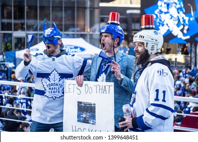 Toronto, ON/Canada - April 15, 2019: Fans Pose With A Sign At The Scotiabank Arena Viewing Party Prior To Game 3 Of The 2019 Stanley Cup Playoffs