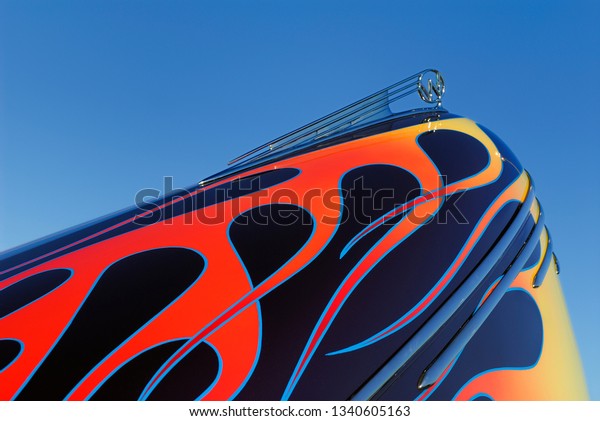 Toronto, Ontario, Canada -\
August 12, 2006: Flaming paint job on Hood of a 1940 Willys coupe\
hot rod