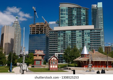 Toronto, Ontario, Canada - August 27, 2010: Historic Railway Museum At The John Street Roundhouse Park With Toronto Skyline