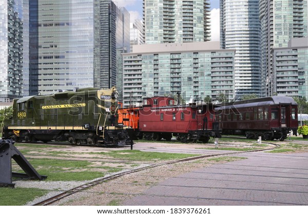Toronto, Ontario /\
Canada - August 28 2018: Old trains display at Roundhouse Park;\
Part of the Railway\
Museum