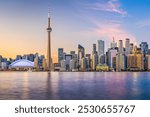 Toronto, Ontario, Canada cityscape on Lake Ontario at dusk.