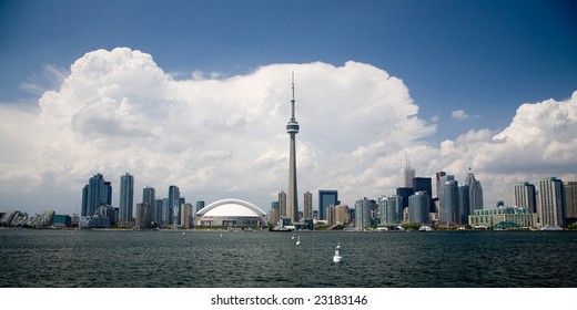 Toronto, Ontario, Canada Daytime Skyline With Clouds In The Background.