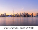 Toronto, Ontario, Canada downtown city skyline on lake Ontario at twilight.