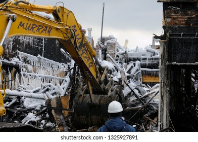 Toronto, Ontario, Canada - February 22, 2008: Demolition Of Buildings After Queen Street West Fire In Toronto On February 20 2008 With Fire Marshal Investigator