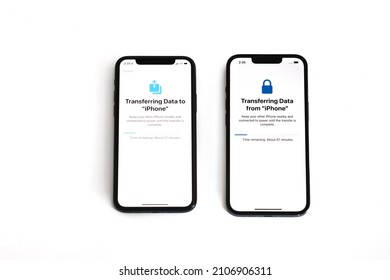 Toronto, Ontario, Canada - January 15, 2022: Transferring Data From Old Iphone 11 Pro To New Iphone 13 Pro During Initial Setup Isolated On White. Iphone Upgrade, Moving Apps And Data Across Device.