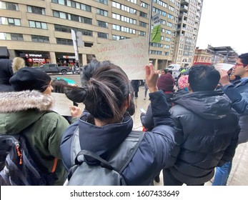 TORONTO, ONTARIO, CANADA - January 6, 2020: Protestors Hold Placards And Shout Slogans Regarding Students Who Are Said To Have Been Injured At The Jawaharlal Nehru University (JNU) In Delhi, India.