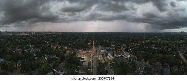 Toronto, Ontario, Canada - Jul 15, 2021: Aerial Panorama Of Heavy Dark Thunder Rain Hail Storm Clouds Low Over A City. Severe, Active Weather Concept.