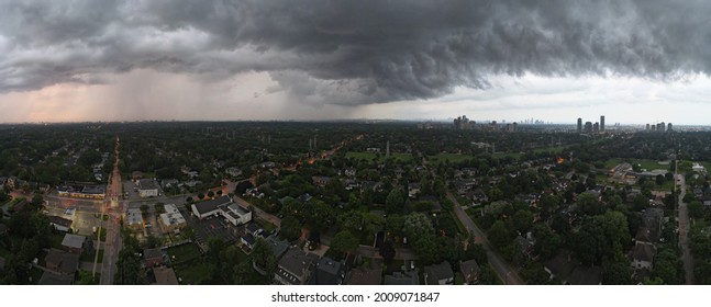 Toronto, Ontario, Canada - Jul 15, 2021: Aerial Panorama Of Heavy Dark Thunder Rain Hail Storm Clouds Low Over A City. Severe, Active Weather Concept.