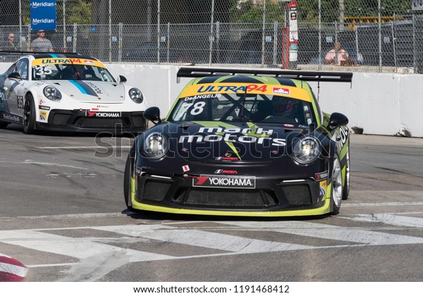 Toronto, Ontario, Canada - July 13 2018: Roman De\
Angelis leads Michael Di Meo in practice for the Porsche GT3 Cup\
race at Exhibition\
Place