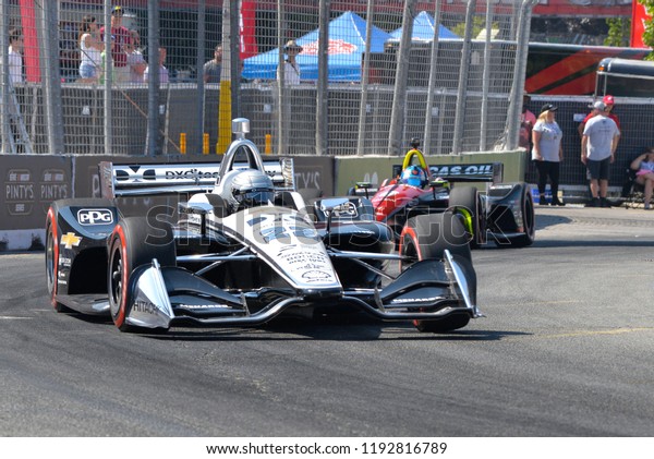 Toronto,\
Ontario, Canada - July 15 2018:  Simon Pagenaud in the early stages\
of the Honda Indy race at Exhibition\
Place