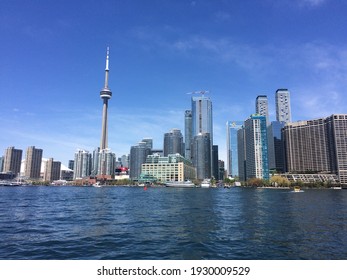 Toronto, Ontario, Canada - July 27, 2019:  View of downtown Toronto  skyline and lake Ontario.