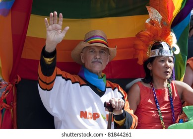 TORONTO, ONTARIO, CANADA - JULY 3: Jack Layton And Olivia Chow At The 2011 Annual Gay Pride Parade In Toronto On July 3, 2011.