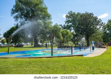 Toronto, Ontario, Canada - July 30 2021 : Kids Having Fun At Playground In The Toronto Islands Centre Island Park.