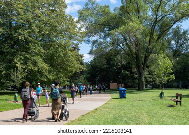 Toronto, Ontario, Canada - July 30 2021 : People Walking In The Toronto Islands Centre Island Park.