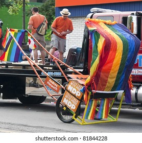 TORONTO, ONTARIO, CANADA - JULY 3:Pride Rickshaw For Jack Layton And Olivia Chow At The 2011 Annual Gay Pride Parade In Toronto On July 3, 2011.