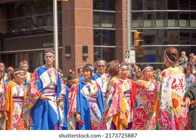 Toronto Ontario, Canada- June 26th, 2022: Japanese People Walking In Toronto’s Annual Pride Parade.