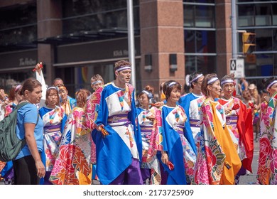 Toronto Ontario, Canada- June 26th, 2022: Japanese People Walking In Toronto’s Annual Pride Parade.