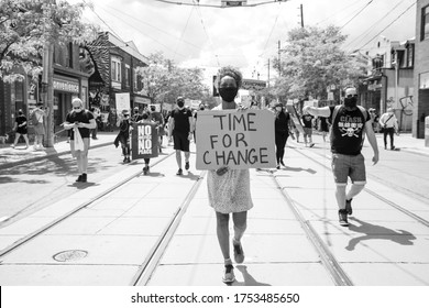 TORONTO, ONTARIO, CANADA - JUNE 6, 2020: Anti-Racism March, In Solidarity With Black Lives Matter And Against The Death Of George Floyd And Police Injustice. 

