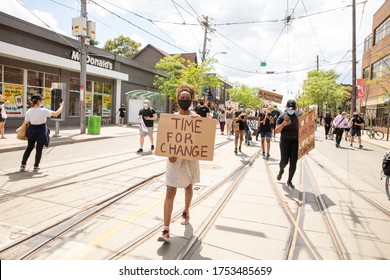 TORONTO, ONTARIO, CANADA - JUNE 6, 2020: Anti-Racism March, In Solidarity With Black Lives Matter And Against The Death Of George Floyd And Police Injustice. 

