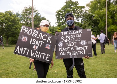 TORONTO, ONTARIO, CANADA - JUNE 6, 2020: Anti-Racism March, In Solidarity With Black Lives Matter And Against The Death Of George Floyd And Police Injustice. 

