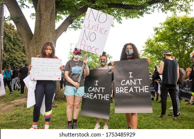 TORONTO, ONTARIO, CANADA - JUNE 6, 2020: Anti-Racism March, In Solidarity With Black Lives Matter And Against The Death Of George Floyd And Police Injustice. 

