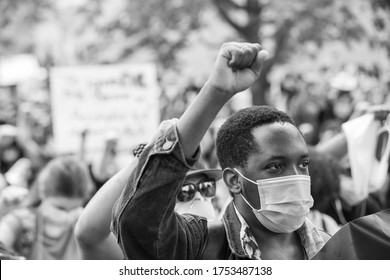 TORONTO, ONTARIO, CANADA - JUNE 6, 2020: Anti-Racism March, In Solidarity With Black Lives Matter And Against The Death Of George Floyd And Police Injustice. 