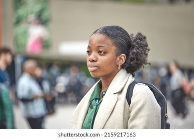 Toronto Ontario, Canada- May 19th, 2022: A Black Lady Listening To A Speaker At A Vigil About The Shooting In Buffalo New York, While At Toronto City Hall’s Nathan Philips Square.