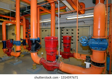 Toronto, Ontario, Canada - May 27, 2009: Electrical Heating Control And Water Pipes In The Boiler Room Of A Highrise Office Building