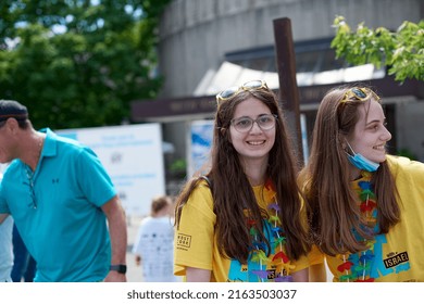Toronto, Ontario Canada- May 29th, 2022: A girl smiling while standing at a booth, while at Beth David synagogue during the annual UJA federation of Greater Toronto’s Walk with Israel.
