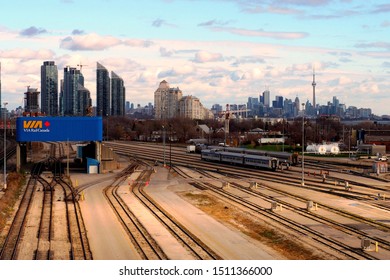 Toronto, Ontario, Canada - November 13, 2015: Toronto Skyline And Cityscape Contrasted Against A Cloudy Blue Sky During The Daytime.