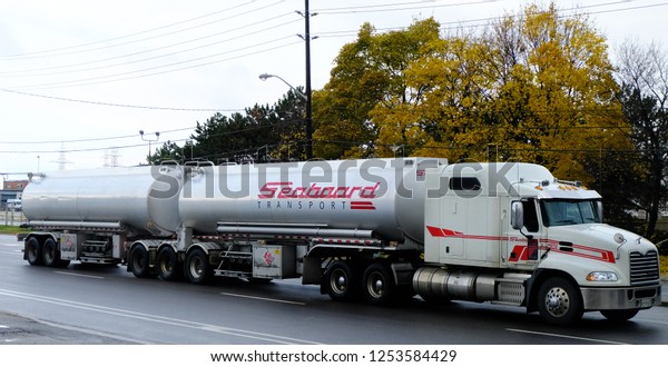Toronto, Ontario / Canada - November 15 2018: A\
Freight truck carrying cargo owned by Seaboard Liquid Carriers Ltd.\
Founded in 1964, they transport heavy and light oils, as well as\
handle product.