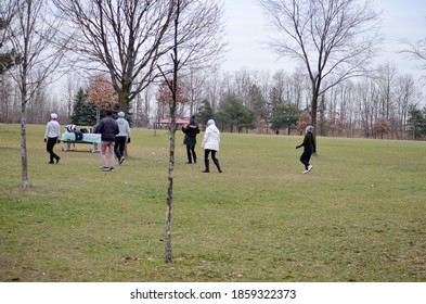 Toronto, Ontario, Canada, November 18, 2020: A Group Of People Wearing Face Masks Take Part In A Dance Exercise Class During The Coronavirus Pandemic In A Toronto City Park. 