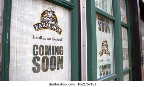 Toronto, Ontario - Canada - November 27, 2020:Coming Soon Sign Covering Windows During City Pandemic Lockdown. The New Farm Boy Grocery Store Located At The Queen's Quay Terminal.