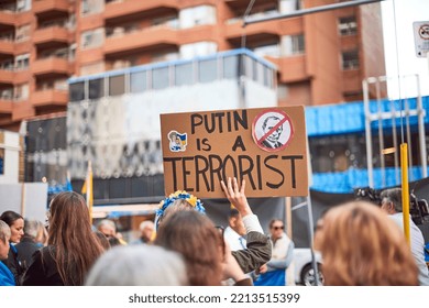 Toronto Ontario, Canada- October 11th, 2022: A Lady Holding Up A Protest Sign During The Protest Against Russia’s Invasion Of Ukraine.