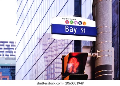 Toronto, Ontario, Canada - October 13, 2021: Bay St Street Sign At Intersection. Bay Street Is The Centre Of Toronto Financial District And Represent Canada's Financial Services Industry.