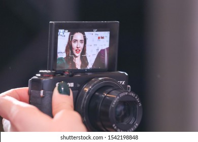 TORONTO, ONTARIO, CANADA - OCTOBER 6, 2019: YouTube Star In Video Monitor At 2019 Buffer Festival, A Festival, Featuring You Tube Content Creators.