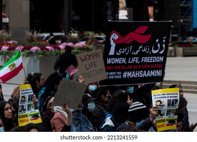 Toronto, Ontario, Canada - October 8 2022: Free Iran Solidarity March Moves South Along Bay St