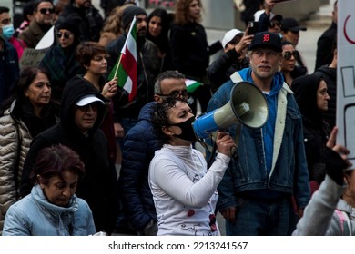 Toronto, Ontario, Canada - October 8 2022: Free Iran Solidarity March Moves South Along Bay St