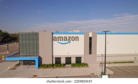 Toronto, Ontario, Canada - September 11, 2022: Amazon Logo On The New Build Modern Building. Amazon Smile Arrow Logo And Brand Trademark. Fulfillment Center Warehouse And Office Building.