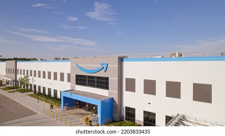 Toronto, Ontario, Canada - September 11, 2022: Amazon Logo On The New Build Modern Building. Amazon Smile Arrow Logo And Brand Trademark. Fulfillment Center Warehouse And Office Building.