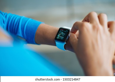 Toronto, Ontario / Canada - September 13th 2019 : Photograph of a person using an Apple Watch series 1/2/3.