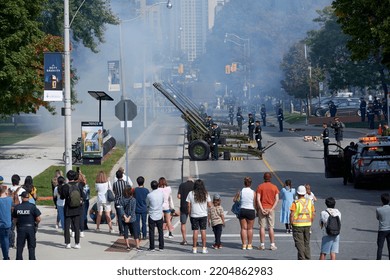 Toronto Ontario, Canada- September 20th, 2022;  People Watching The Cannon Salute To Queen Elizabeth Ii At Queens Park In Downtown Toronto.