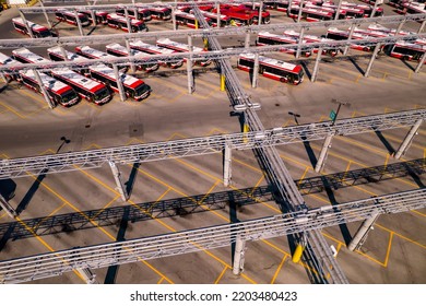 Toronto, Ontario, Canada – September 9, 2022: TTC Buses Public Transit At Maintenance Bus Bay And Bus Stop Storage Facility At Parking At Golden Hour And Long Shadows Ready To Serve City Commuters. 