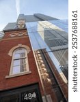 Toronto, Ontario - IMMIX Condominiums and Heritage Fire Hall Tower from Directly Below