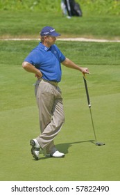 TORONTO, ONTARIO - JULY 21: South African Golfer Retief Goosen Waiting For His Turn To Putt During A Pro-am Event At The RBC Canadian Open Golf On July 21, 2010.