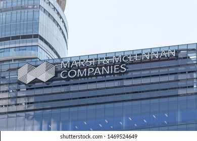 TORONTO, ONTARIO - July 24, 2019: Marsh & Mclennan Companies Logo Atop Of Their Building In Downtown Toronto.