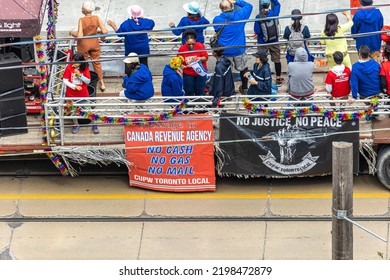 Toronto, Ontario - September 5, 2022 : Canadian Union Of Postal Workers Toronto Local Marching At The Labour Day Parade On Queen Street West